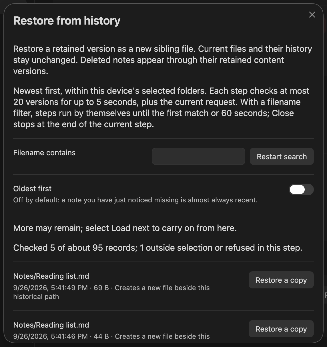 The Restore from history dialog listing three versions of a note, newest first, each with Restore a copy